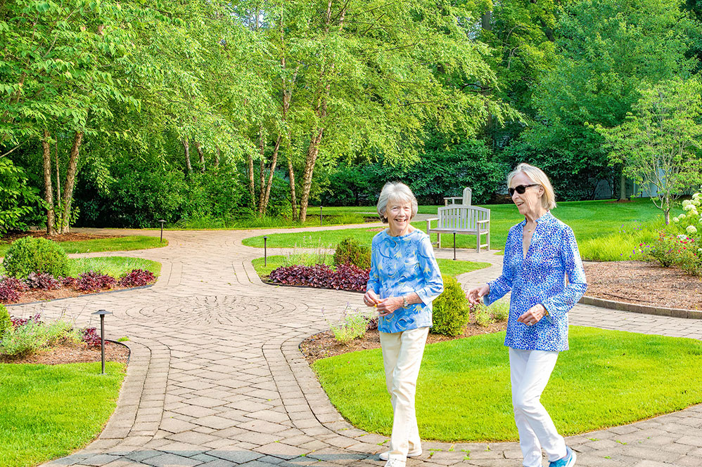 Senior women walking in the courtyard