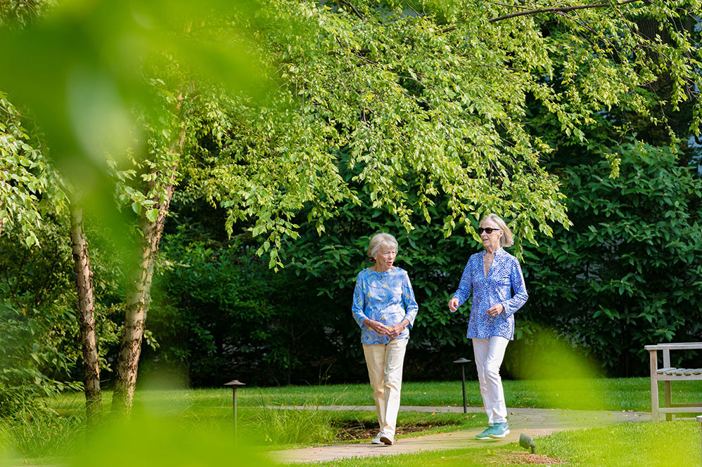 Couple of senior ladies walking on the trail